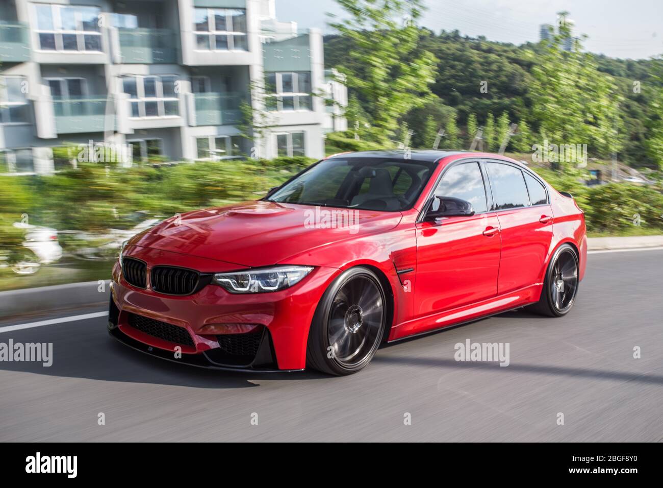 Freeway Red Red universal suv freeway drive in the architectural zone Stock Photo ...