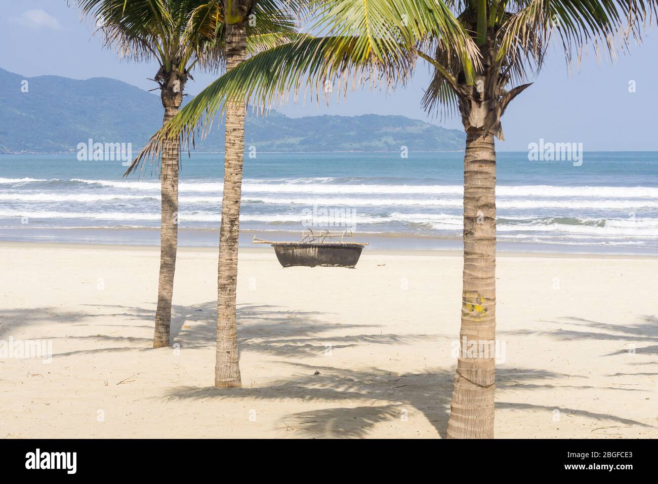 Vietnam beach - Round boat at My Khe Beach in Da Nang in Vietnam, Southeast Asia. Stock Photo