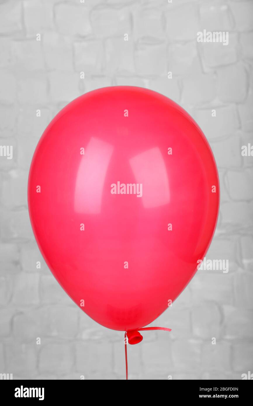 Color balloon on grey wall background Stock Photo - Alamy