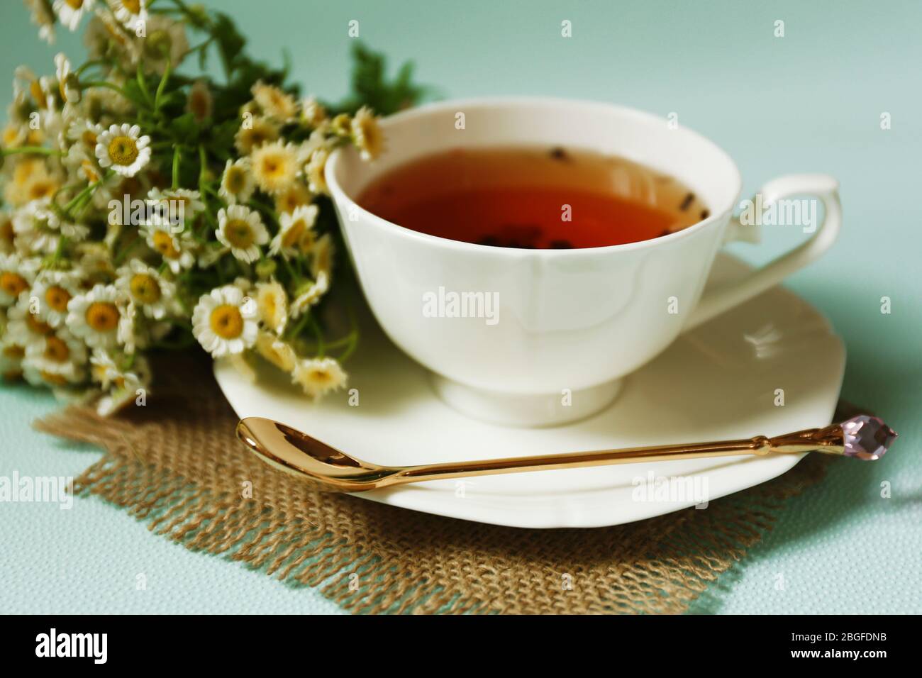 Cup of fresh herbal tea on table Stock Photo - Alamy