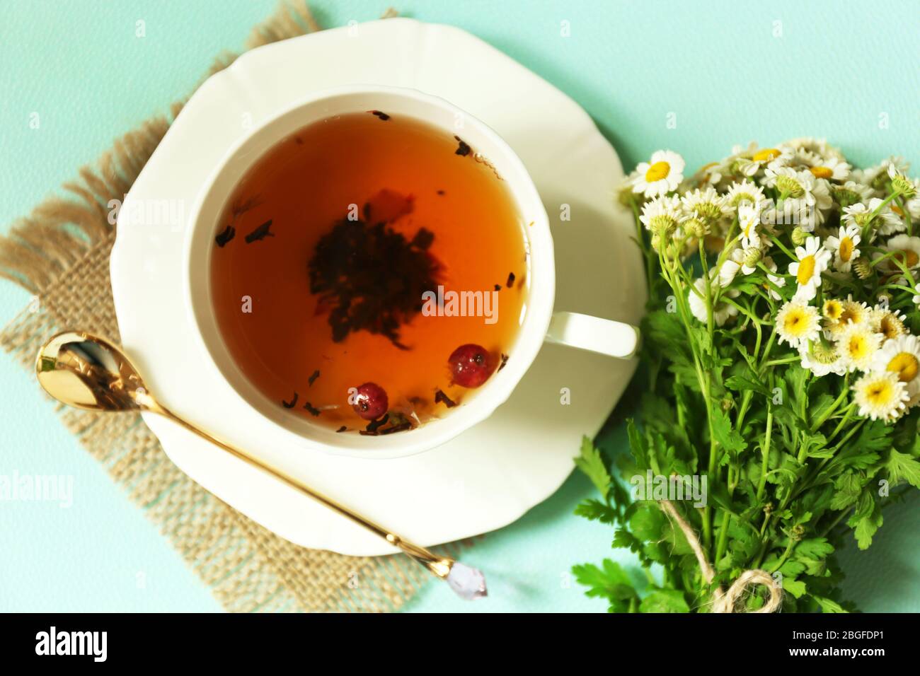 Cup of fresh herbal tea on table Stock Photo - Alamy