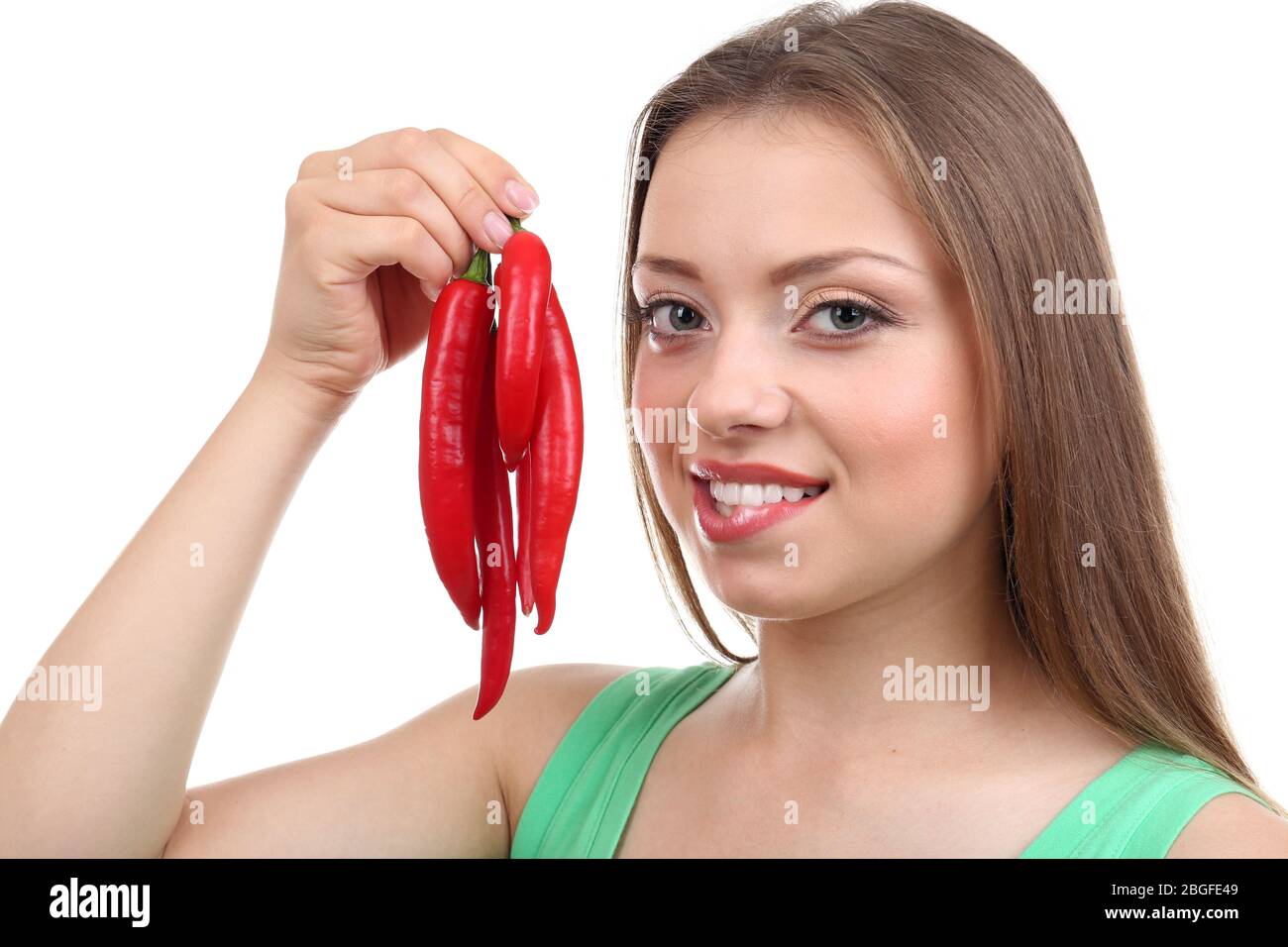 Beautiful girl with chili pepper, isolated on white Stock Photo Alamy