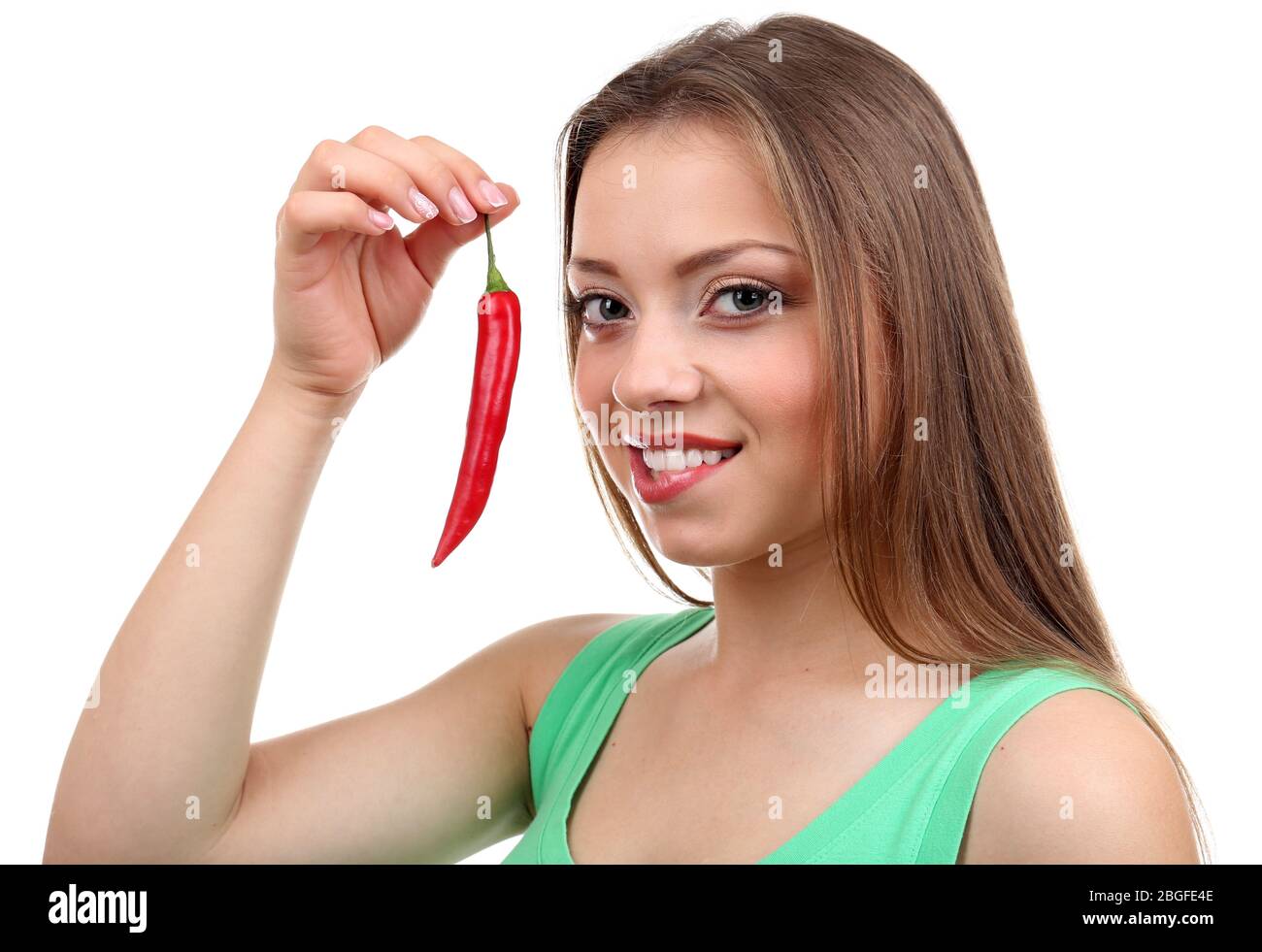 Beautiful girl with chili pepper, isolated on white Stock Photo Alamy
