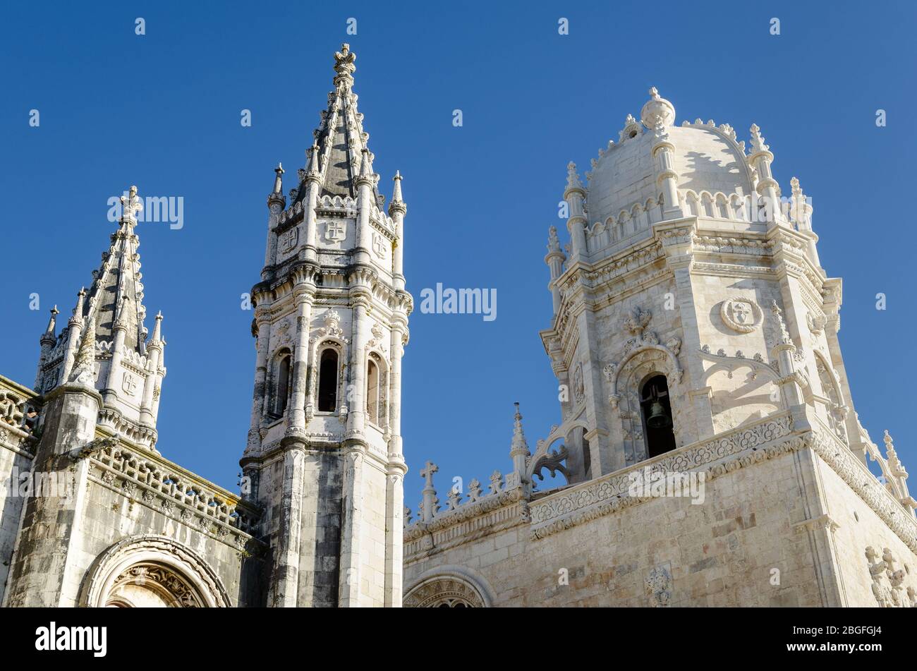 The Jeronimos monastery in Belem, Lisbon, best example of late gothic manueline architecture in Portugal. Detail of bell tower and dome of the Santa M Stock Photo