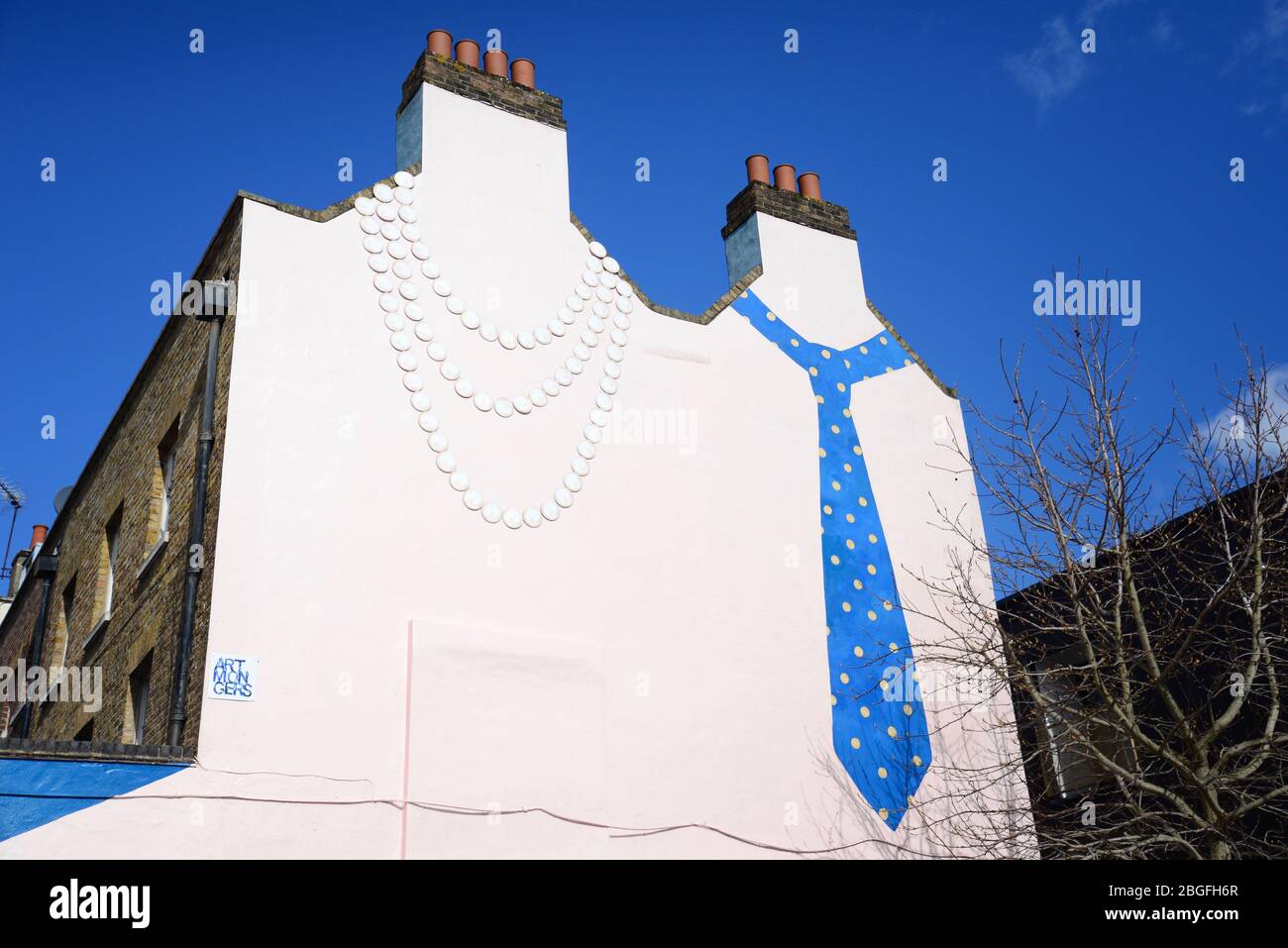'His n Hers' mural by Patricio Forrester/Artmongers (2002), Deptford High Street, London Stock Photo