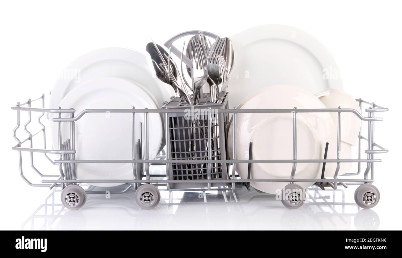 Clean dishes drying on metal dish rack, isolated on white Stock Photo