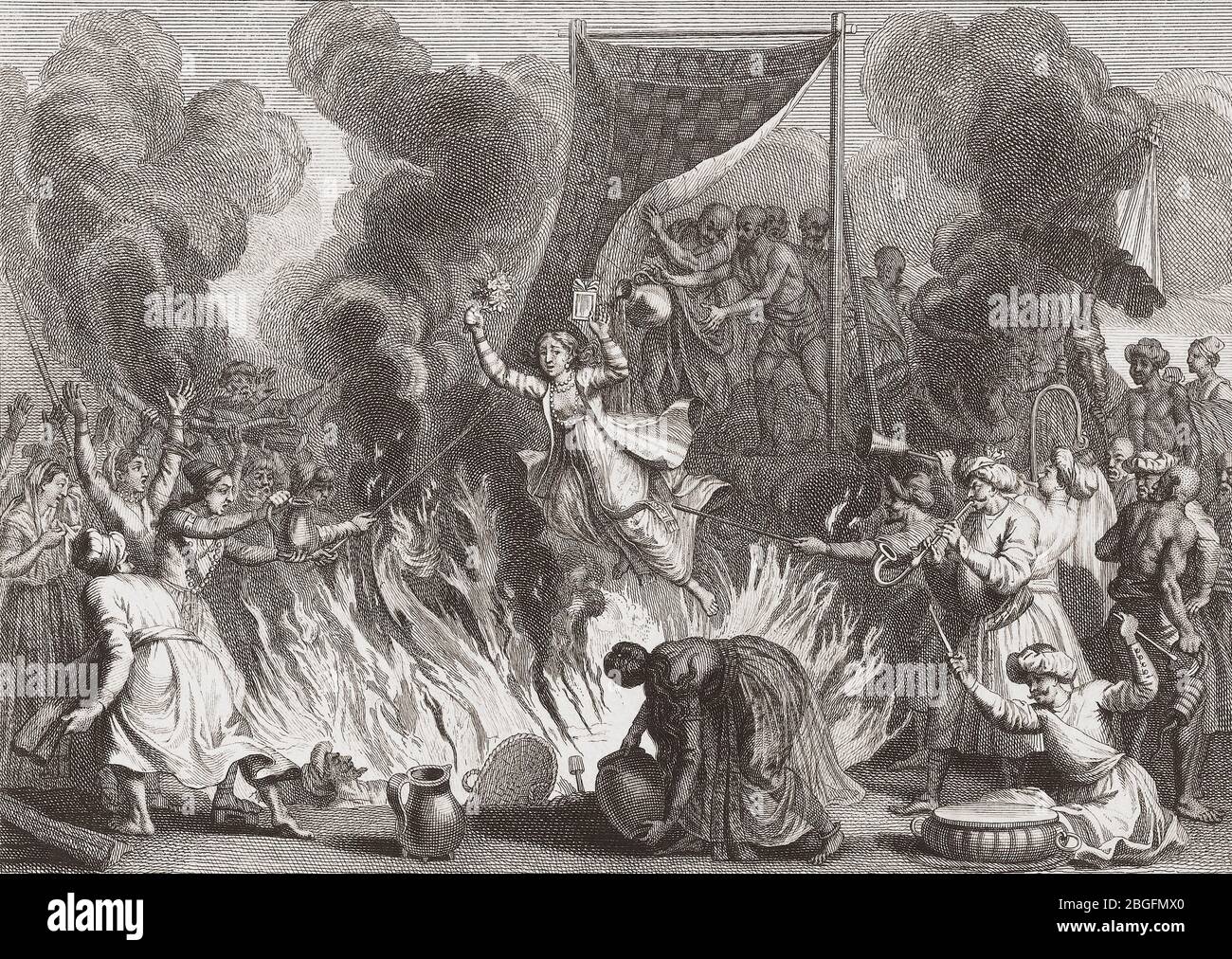 In India, a Hindu woman throws herself into the flames as her husband's body is cremated.   The practice of a widow joining her dead husband in death is called Sati or Suttee.  A less common form of Sati was for the widow to be buried alive with her dead husband.  Sati in any form is now illegal.  After an 18th century work by Bernard Picart. Stock Photo