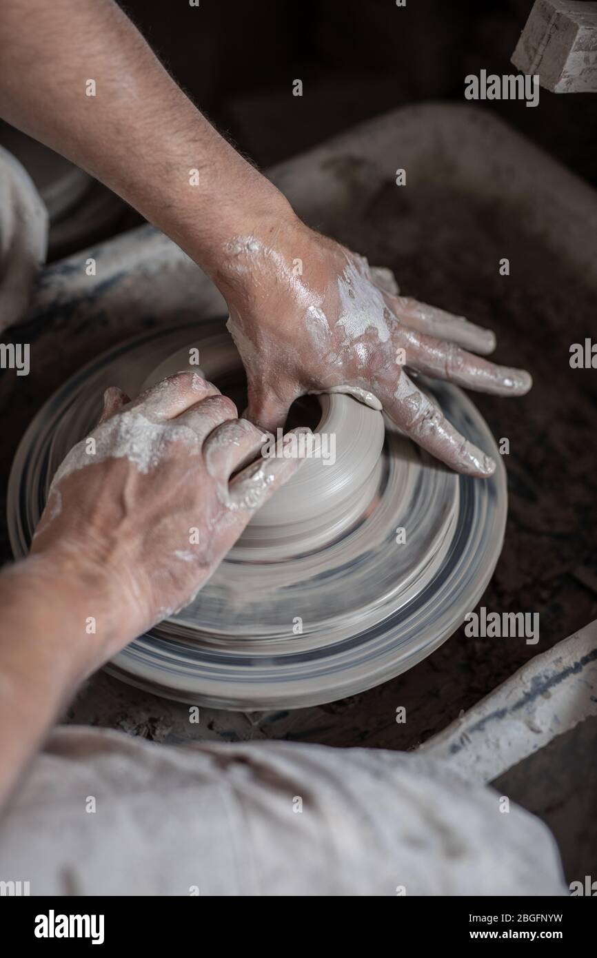A potter working with clay Stock Photo Alamy
