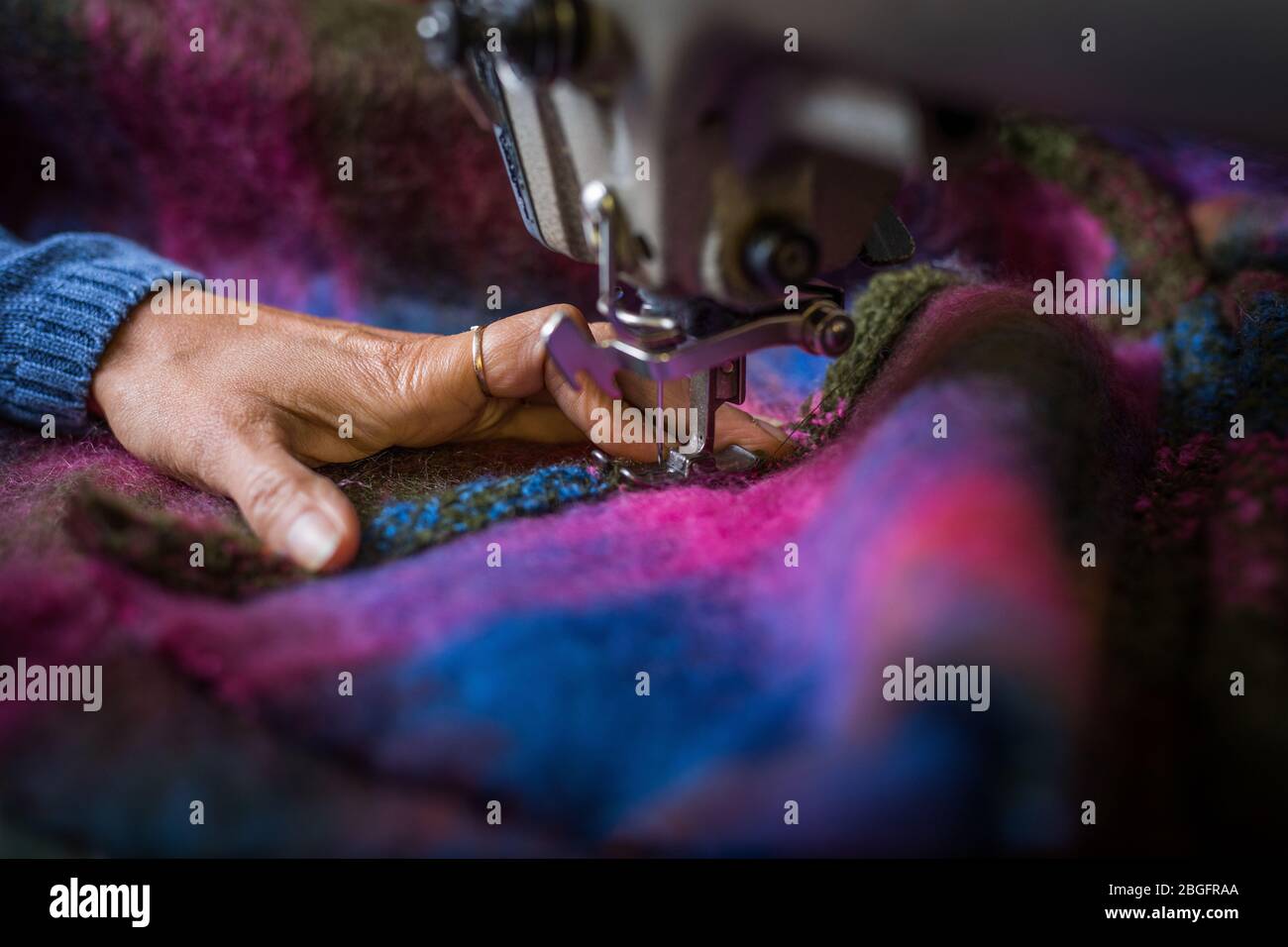 Sewing fabric in a textile factory Stock Photo Alamy