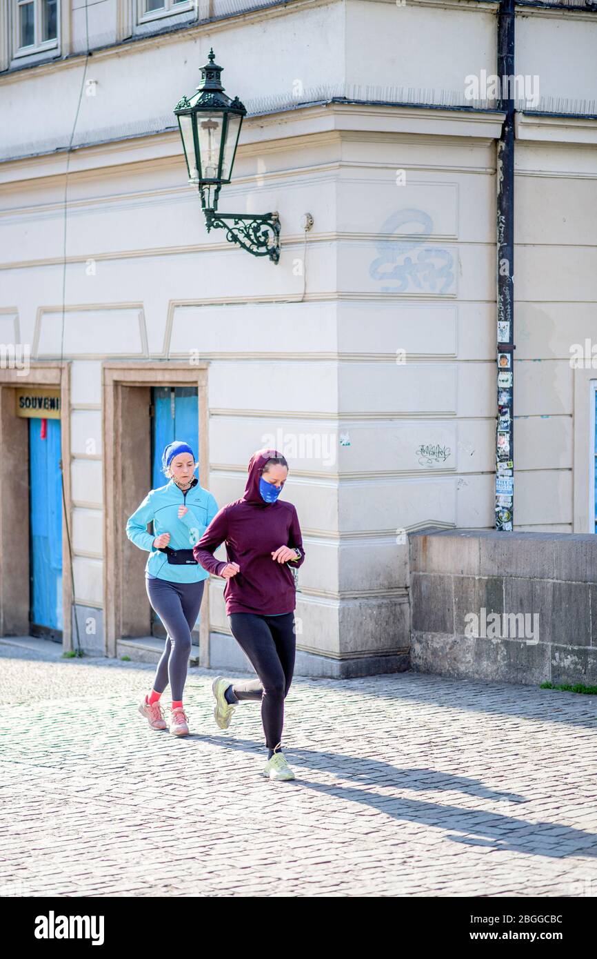 People jogging in the streets of Prague during Quarantine Stock Photo