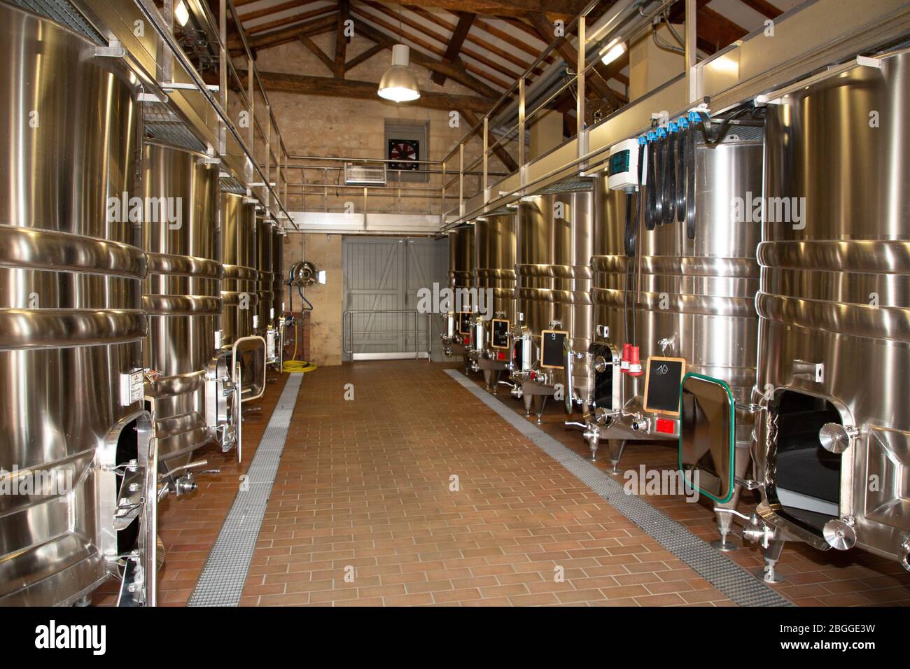 Wine factory Production in tank cellar container Stock Photo Alamy