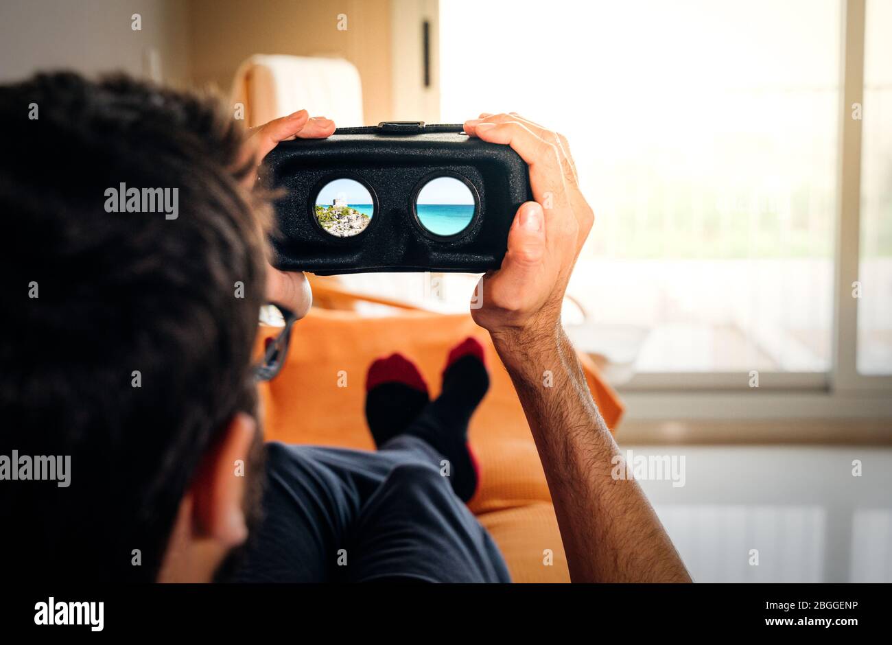 Man using VR headset and doing Virtual reality travel Stock Photo