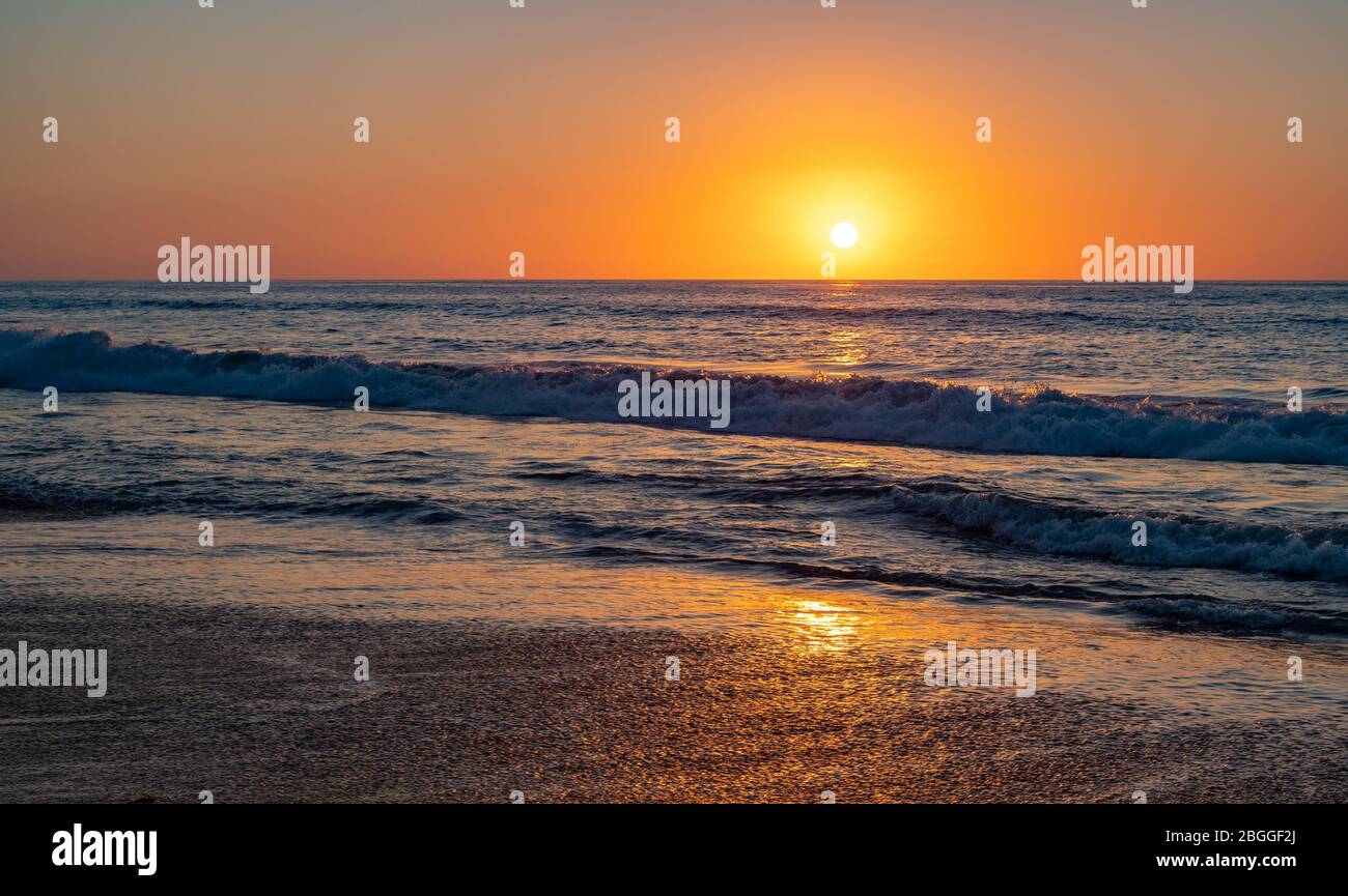 Blue sky with clouds over beach hi-res stock photography and images - Alamy
