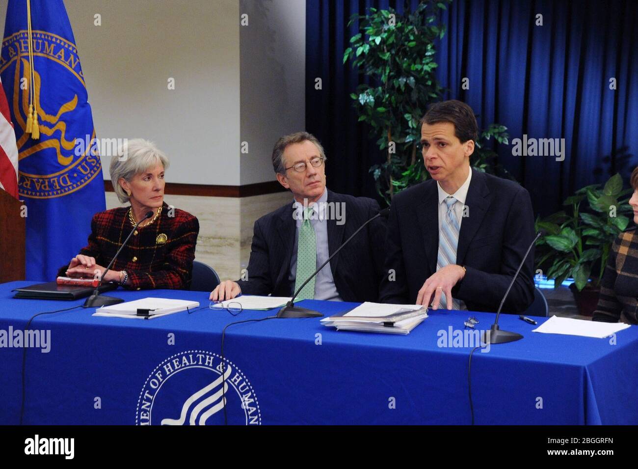 HHS Secretary Kathleen Sebelius, Director of the Office of Consumer Information and Insurance Oversight Jay Angoff and Rhode Island Health Insurance Commissioner Christopher F. Koller at a press conference. Stock Photo