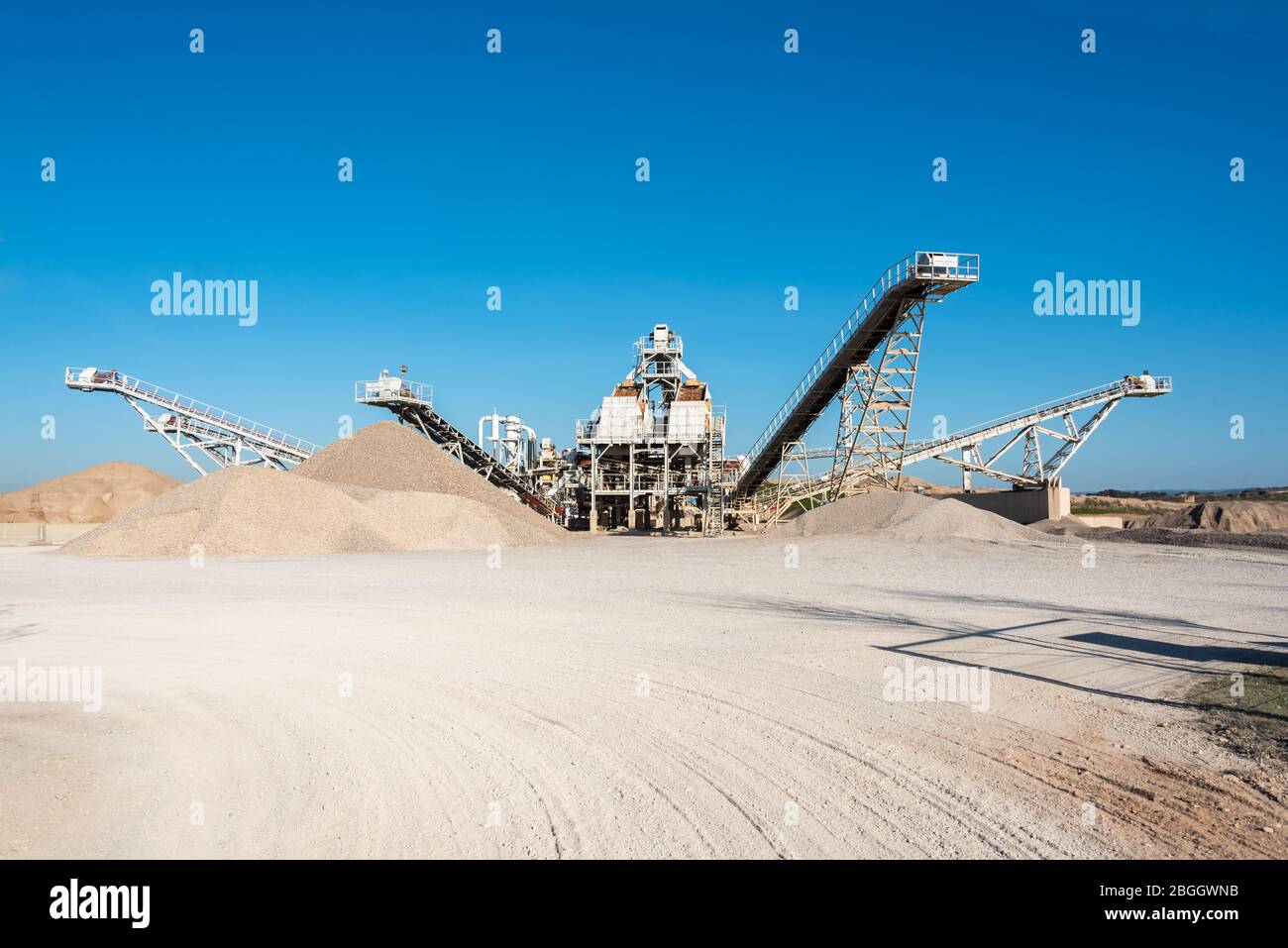 February 19, 2020 - Belianes-Preixana, Spain. A Gravel pit with heavy machinery on the edge of the SPA (Special protected area) Belianes-Preixana. Stock Photo