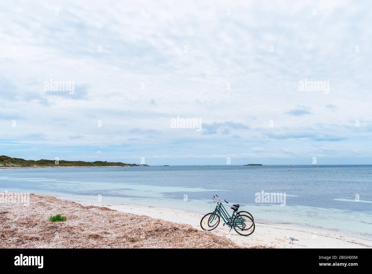 Two bicycles parked on a beach on Rottnest Island, Western Australia