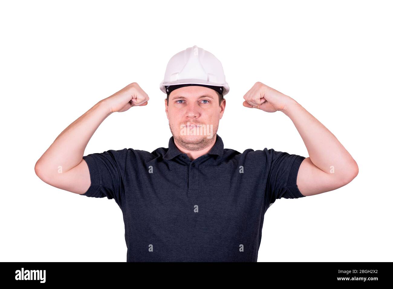 white male engineer in a white hard hat Stock Photo