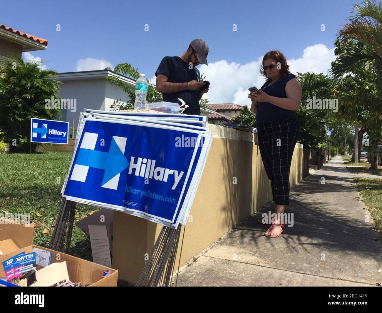 Hillary Clinton volunteers walk through Little Havana trying to seek votes for the Democratic candidate ahead of the March 15, 2016, primary in Florida. Stock Photo