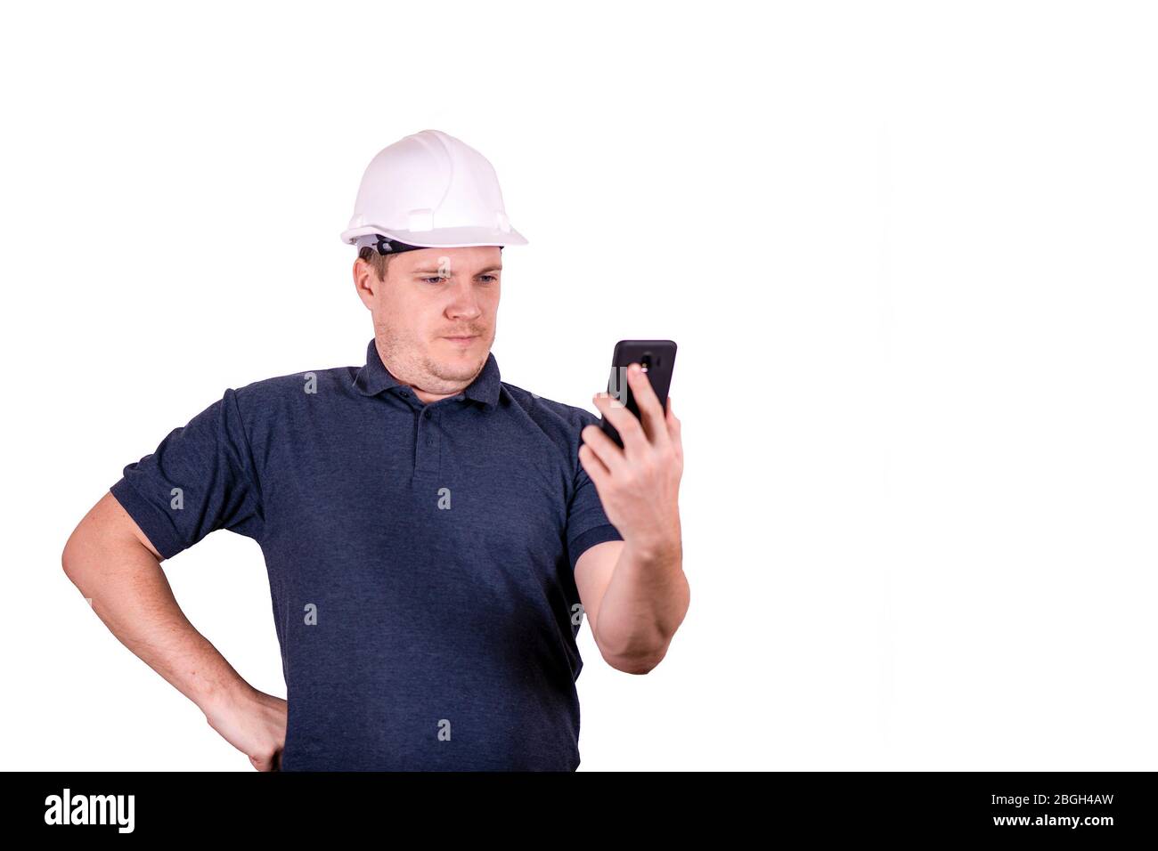 white male engineer in a white hard hat Stock Photo Alamy