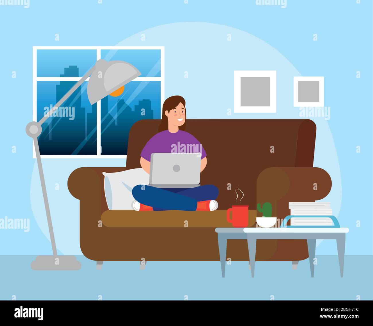 woman working in telecommuting sitting in couch with laptop Stock ...