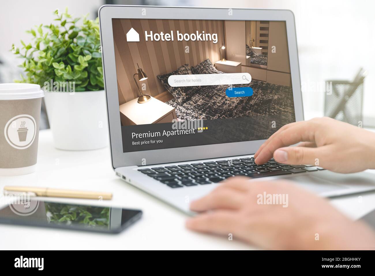 Man makes hotel reservations via the internet. Tourism, vacation concept Stock Photo