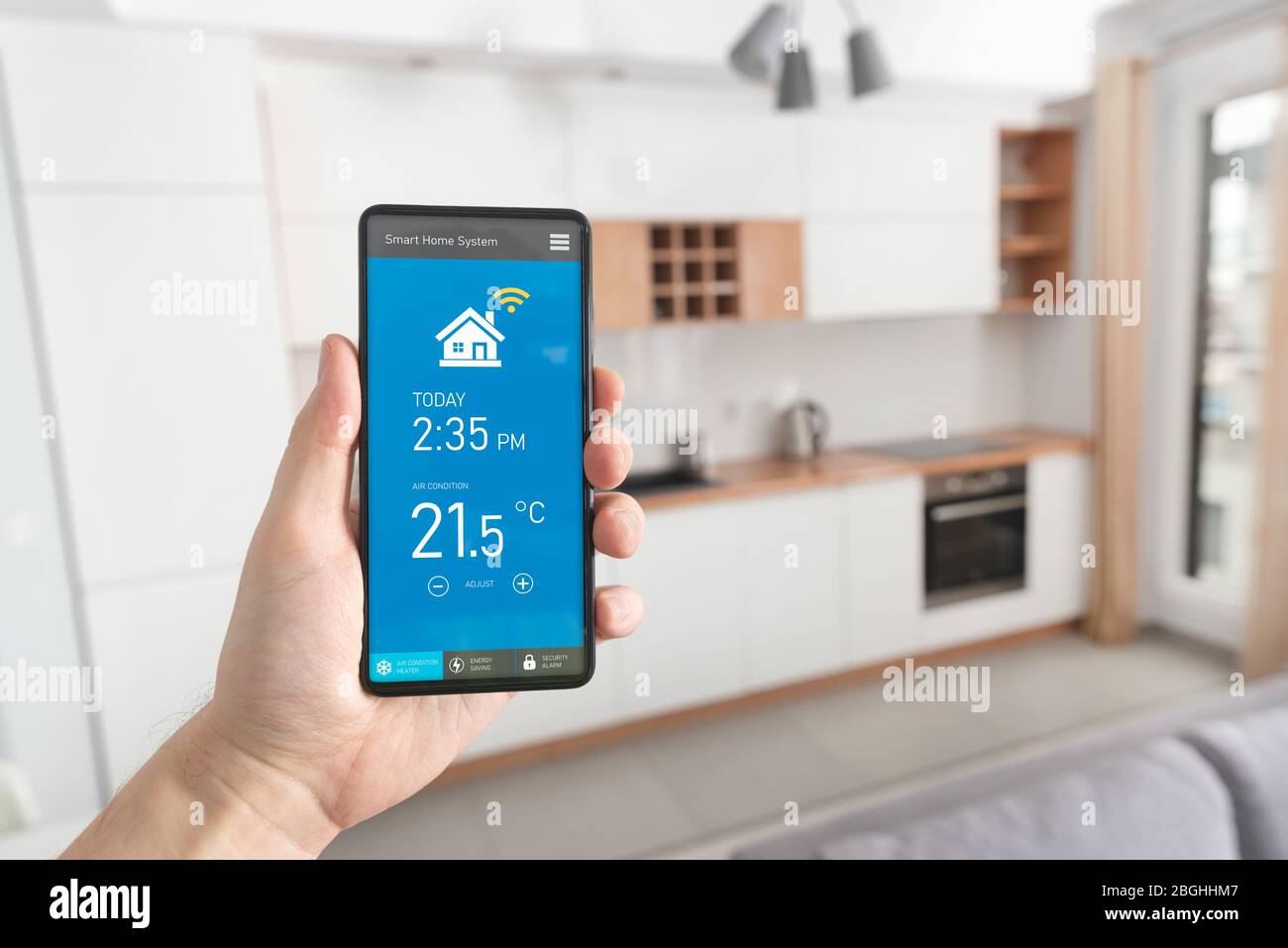 Smart home system on phone app. Temperature, energy efficiency, security control. Stock Photo