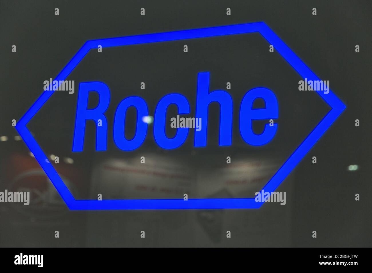 KYIV, UKRAINE - APRIL 20, 2016: Roche logo closeup at booth during VII International Medical Forum. Hoffmann-La Roche AG is a Swiss multinational heal Stock Photo