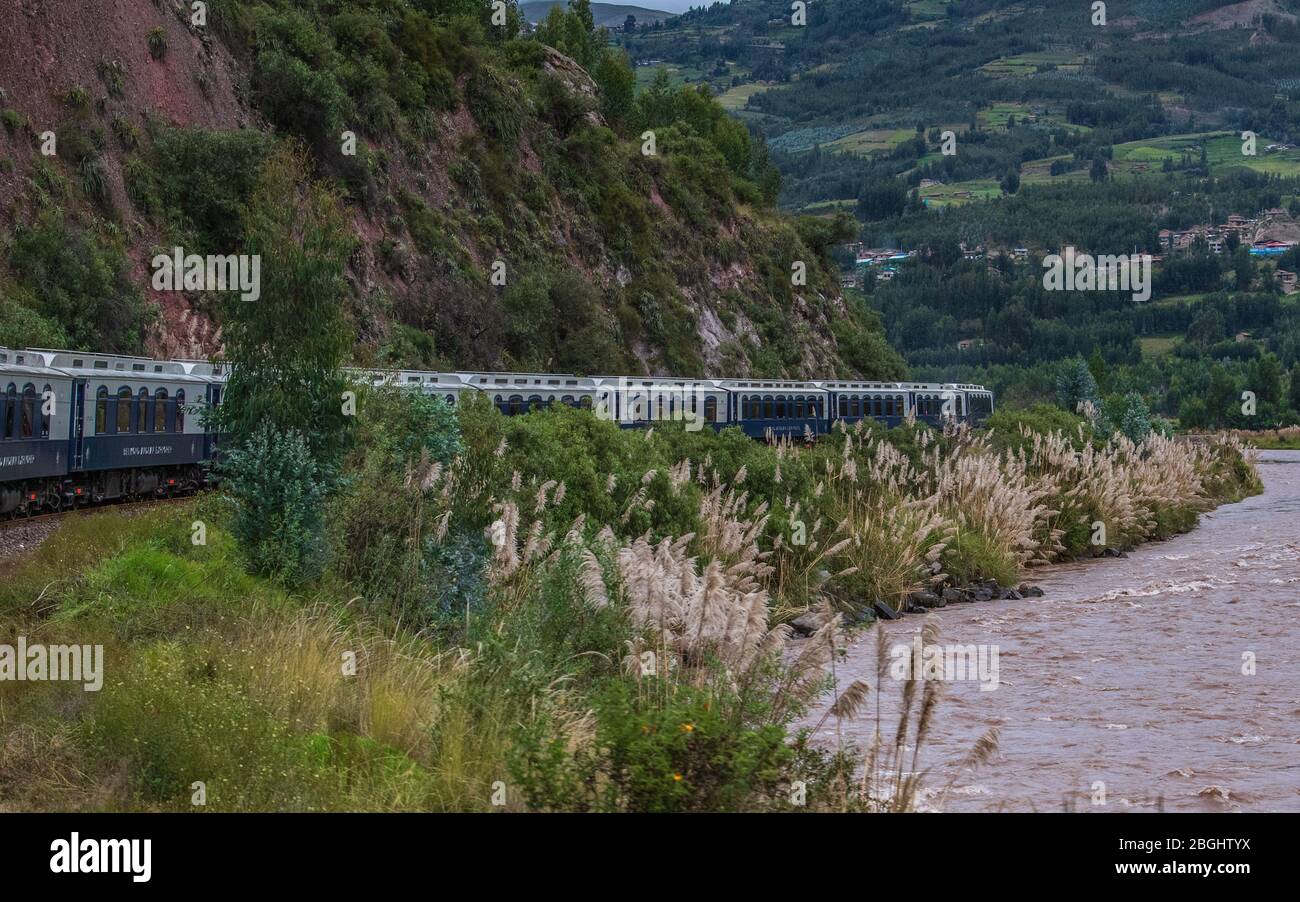Train travelling through Peru (Puno to Cusco or Cusco to Puno). Landscape Stock Photo