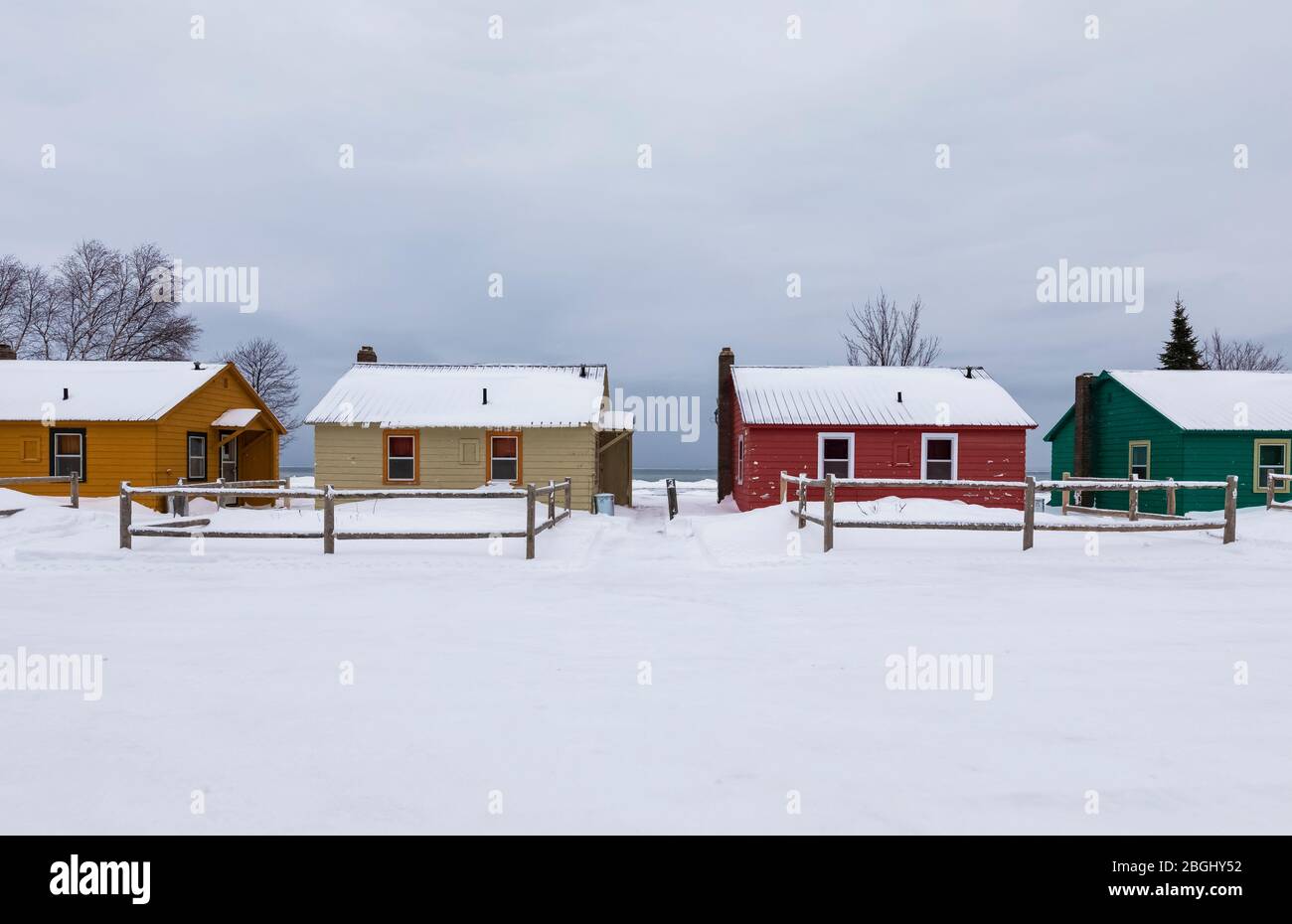 Cute Saunders Sunrise Cabins along Whitefish Bay of Lake Superior in winter, Upper Peninsula