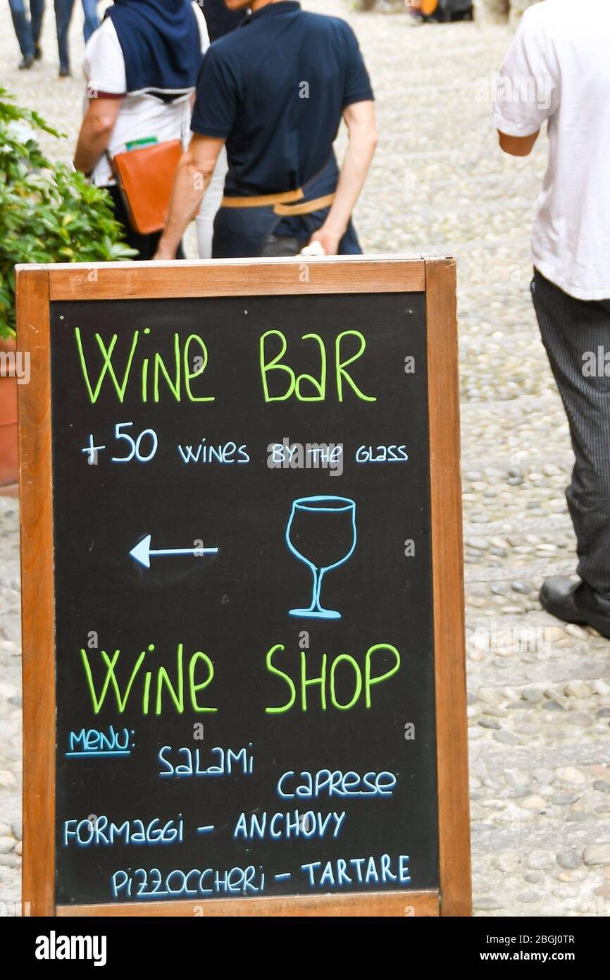 BELLAGIO, LAKE COMO, ITALY JUNE 2019 Sign outside a wine bar and