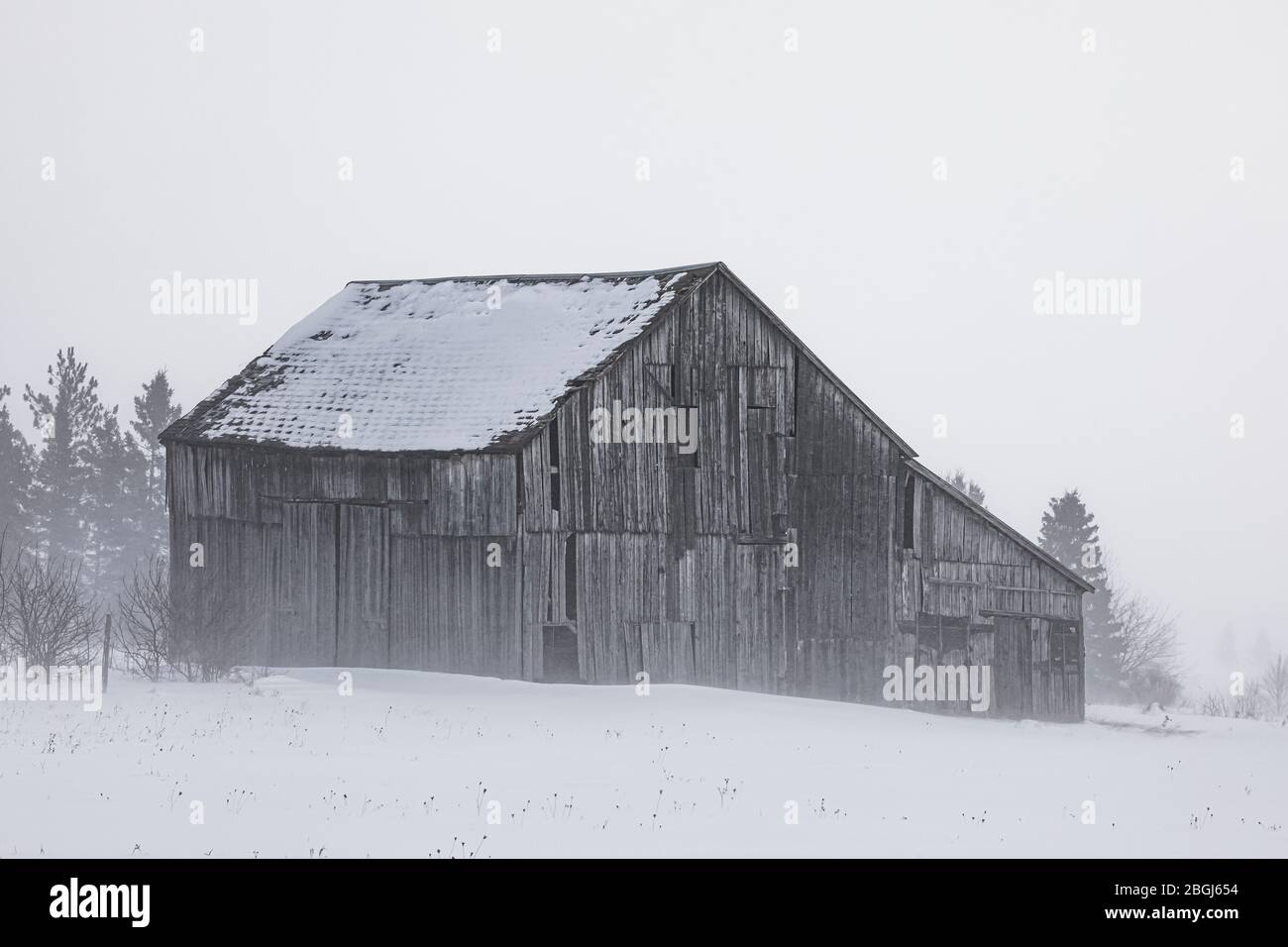 Barn with blowing snow on a winter day in the eastern Upper Peninsula