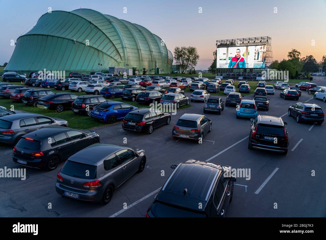 Drive-in cinema at Essen/Mülheim Airport, 'Motor Movies', temporary film screening, at the WDL airship hangar, event in compliance with contact restri Stock Photo