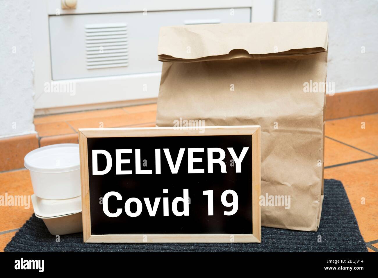home delivery service, boxes standing by the house doors Stock Photo ...