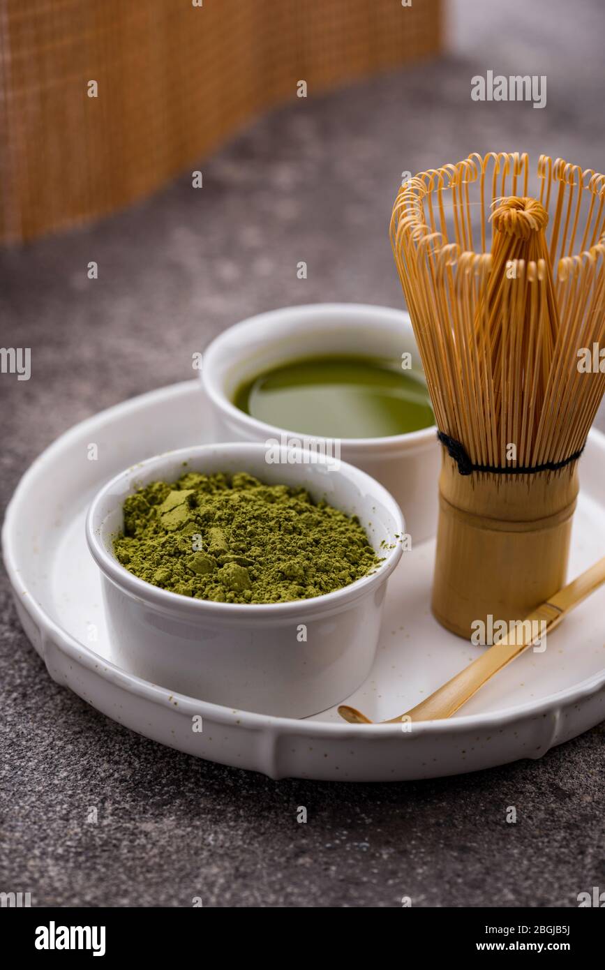 Matcha tea and bamboo whisk Stock Photo Alamy