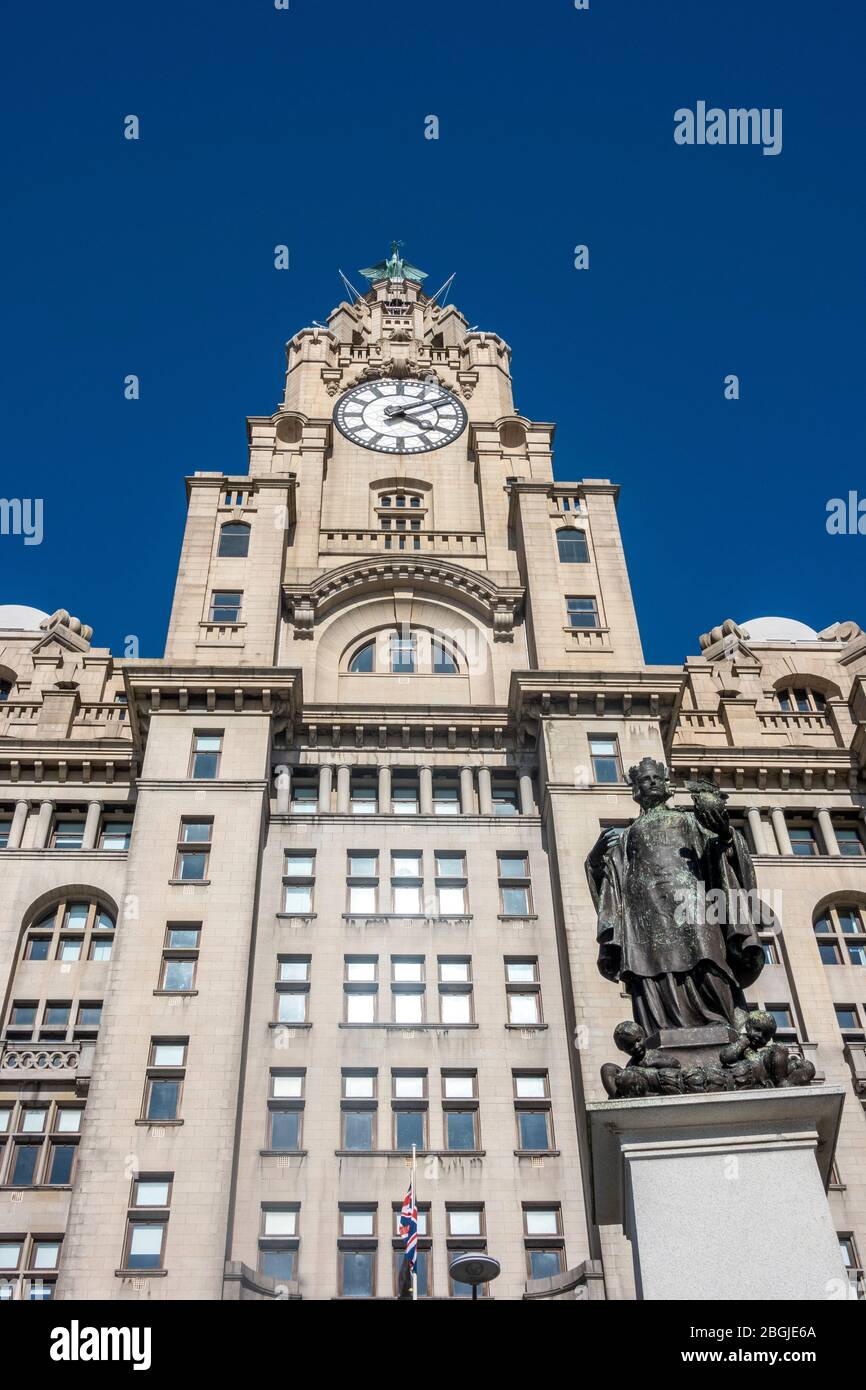 Statue on Pro Patria monument in front of the Royal Liver Building at Pier Head in Liverpool Stock Photo
