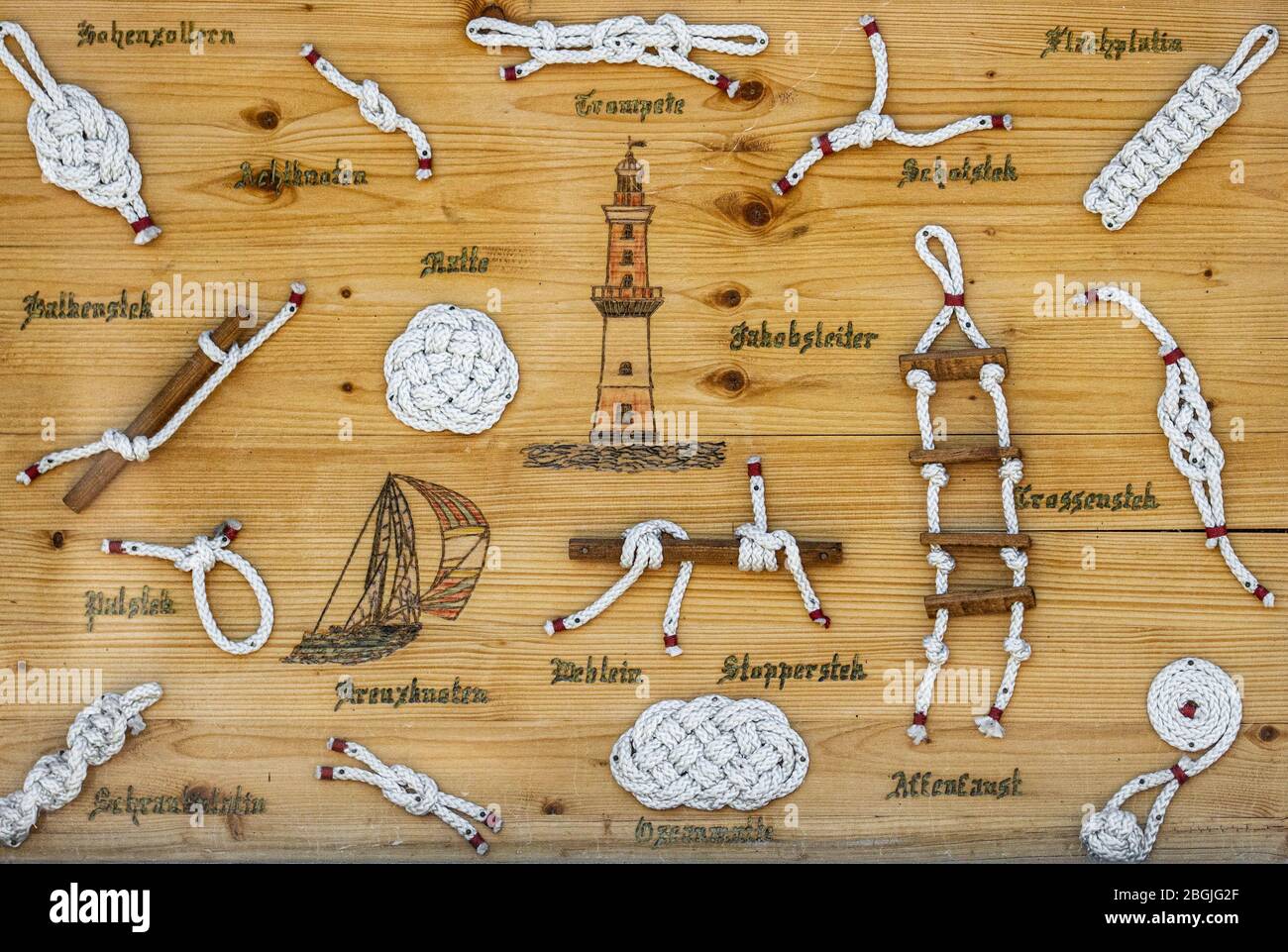 This decorative display board shows a few different sailor knots. Stock Photo
