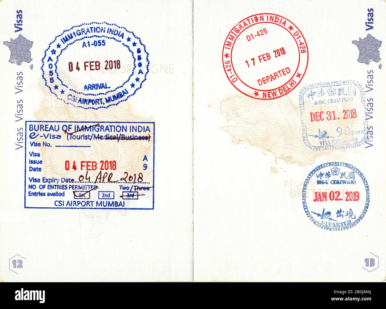 Immigration stamps of India and Taiwan in a French passport Stock Photo