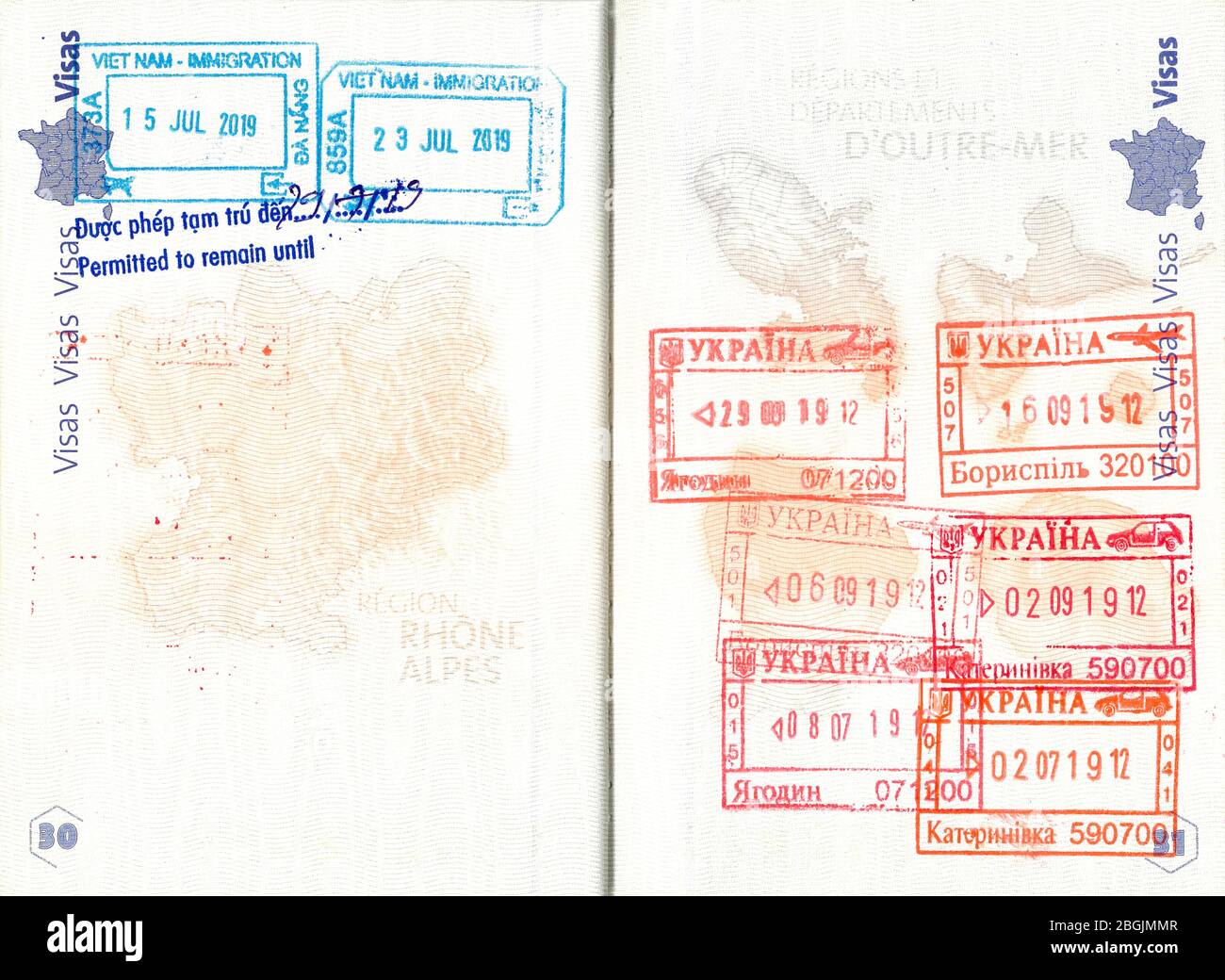Stamps of Vietnam and Ukraine in French passport Stock Photo