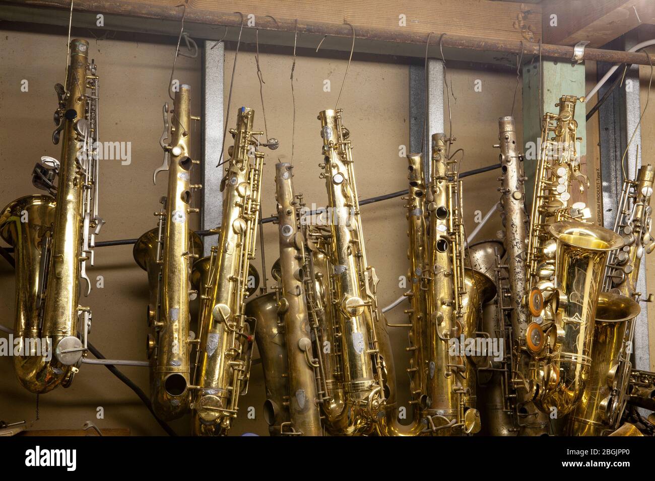 Instruments in a music repair shop Stock Photo Alamy