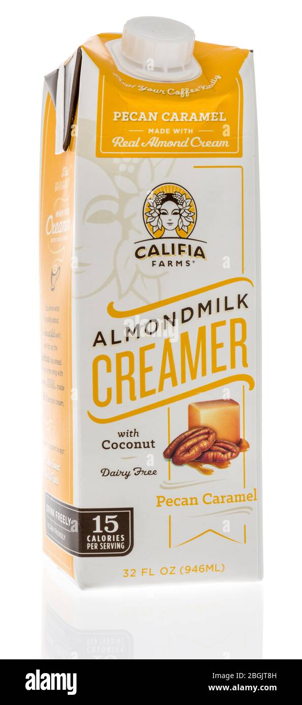 Winneconne,  WI - 21 April 2020:  A package of Califia Farms almond milk creamer with coconut on an isolated background. Stock Photo