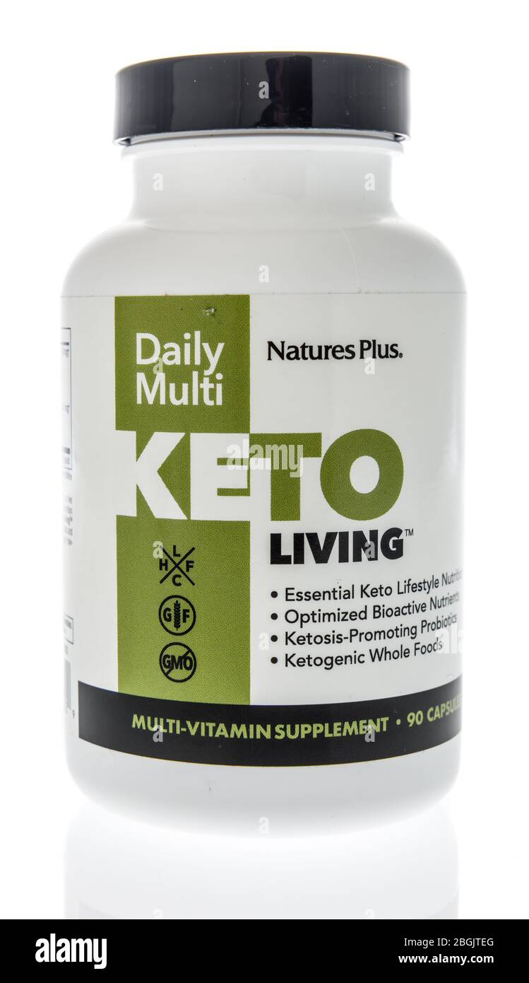 Winneconne,  WI - 21 April 2020:  A bottle of Natures Plus keto living multi-vitamin supplement on an isolated background. Stock Photo
