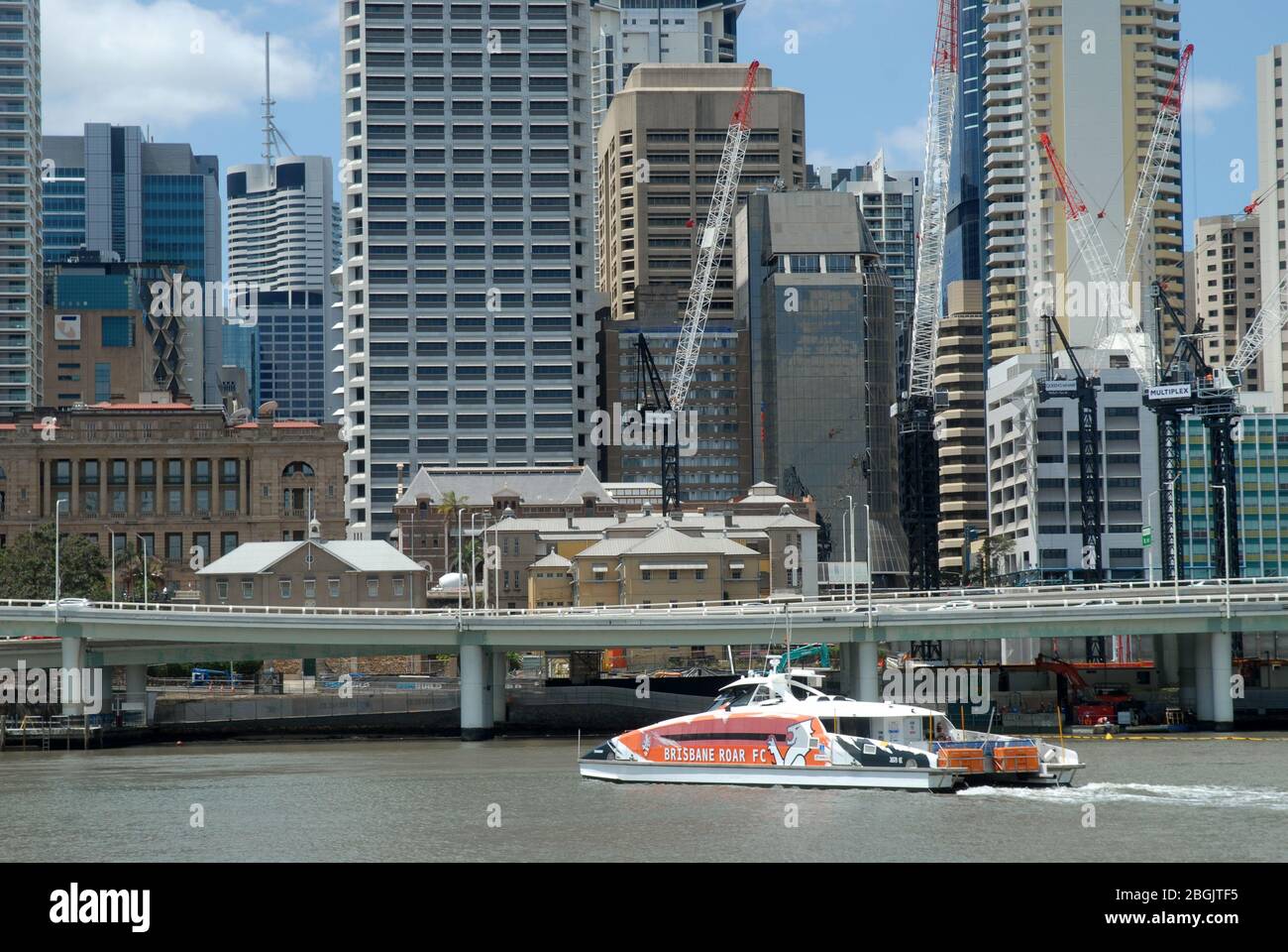 City Cat heading downstream on Brisbane River, Brisbane, Queensland, Australia. Stock Photo