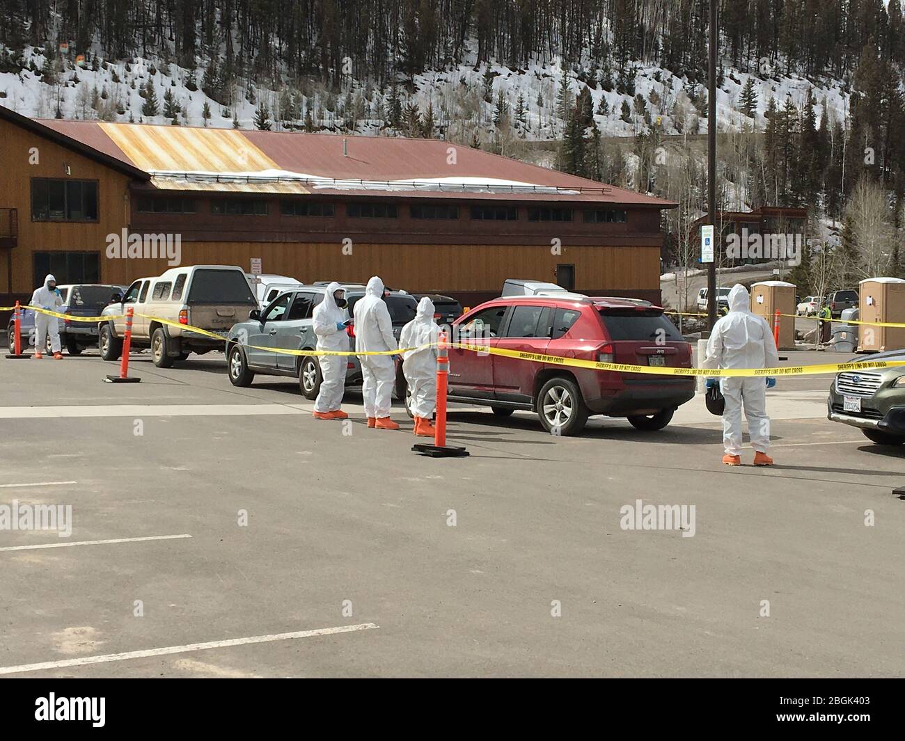 Members of the Colorado National Guard assist San Miguel County and the Colorado Department of Public Health & Environment with a COVID-19 drive-up testing station in Telluride, Colorado, March 17, 2020. The two specialized teams, 8th Weapons of Mass Destruction-Civil Support Team and Chemical, Biological, Radiological, Nuclear and high-yield Explosive Enhanced Response Force Package are Colorado’s resident trained and equipped experts in biological hazards. Colorado’s 8th WMD-CST and CERFP are available to the governor and Federal Emergency Management Agency Region Eight. (U.S. Army National Stock Photo