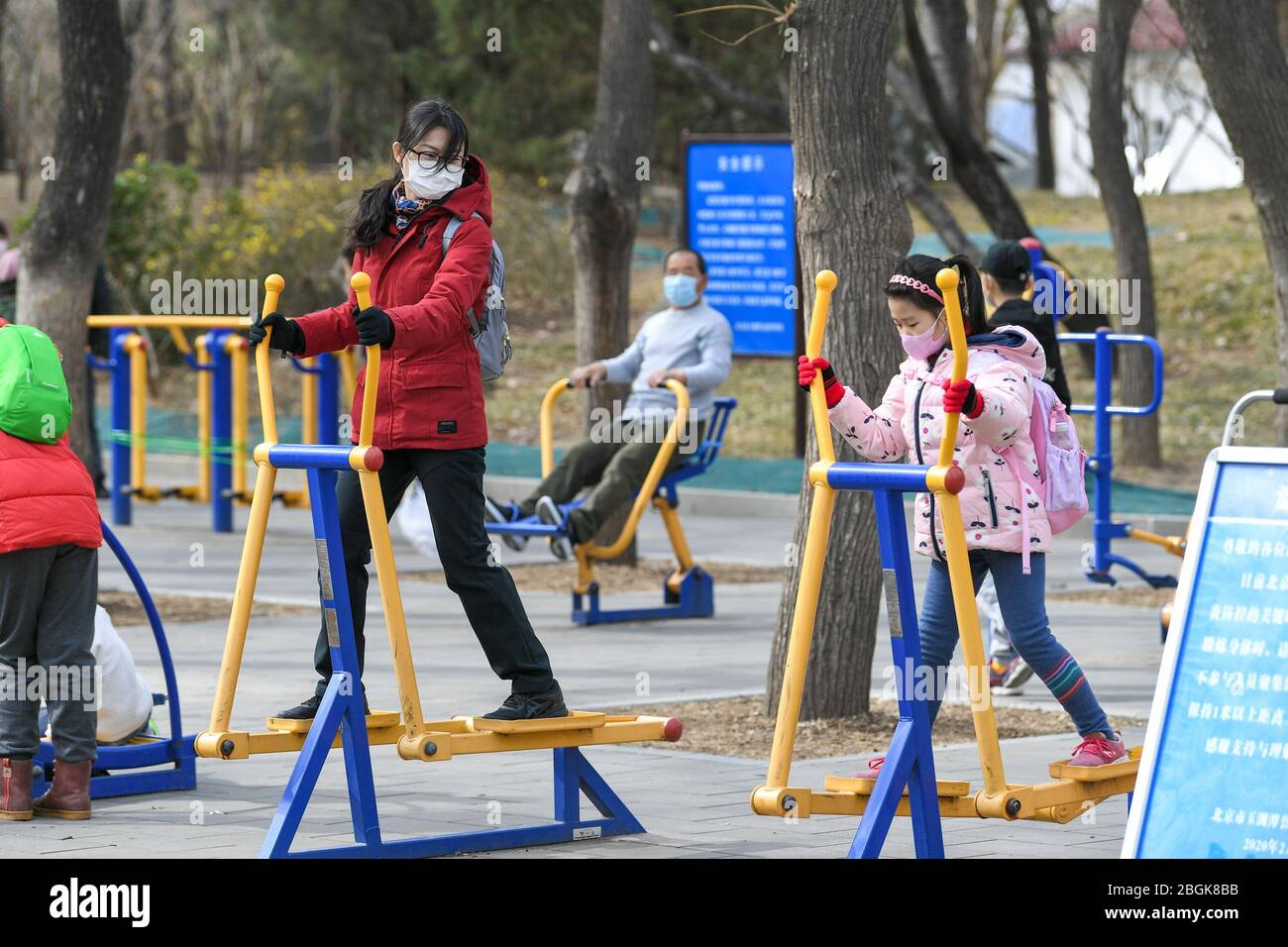 Citizens do exercise by jogging or with fitness equipment at a local park  as weather warms up, Beijing, China, 12 March 2020. *** Local Caption ***  fa Stock Photo - Alamy