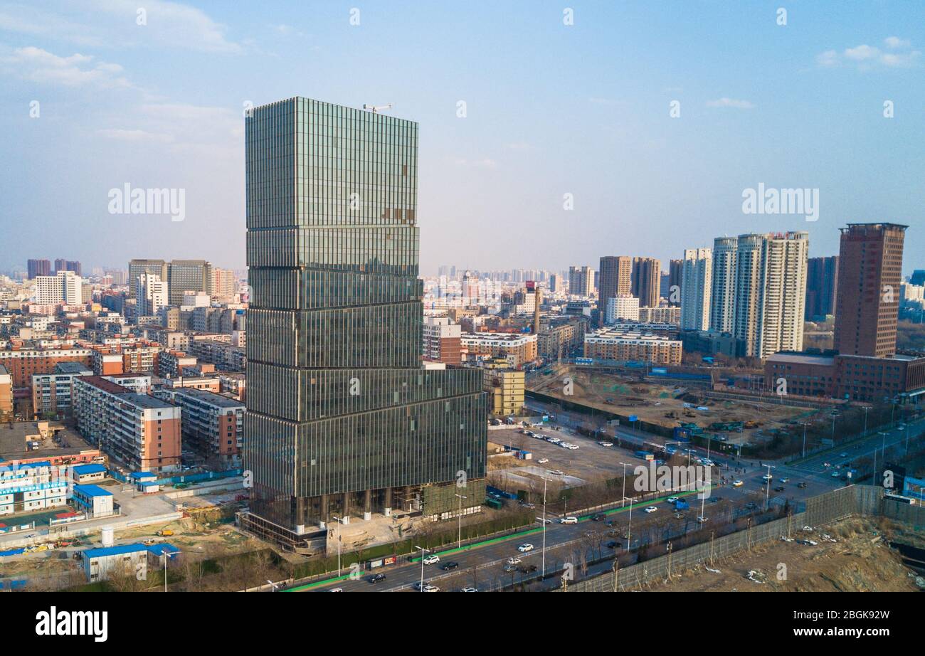 An aerial view of a 50-meter-high boot-like building that attracts citizens  with its unique shape in city canter of Shenyang city, northeast China's L  Stock Photo - Alamy