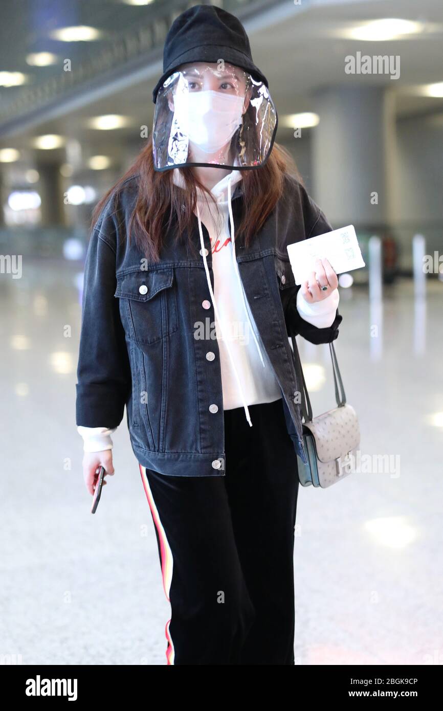 Chinese actress Zhang Meng or Alina Zhang arrives at a Beijing airport ...