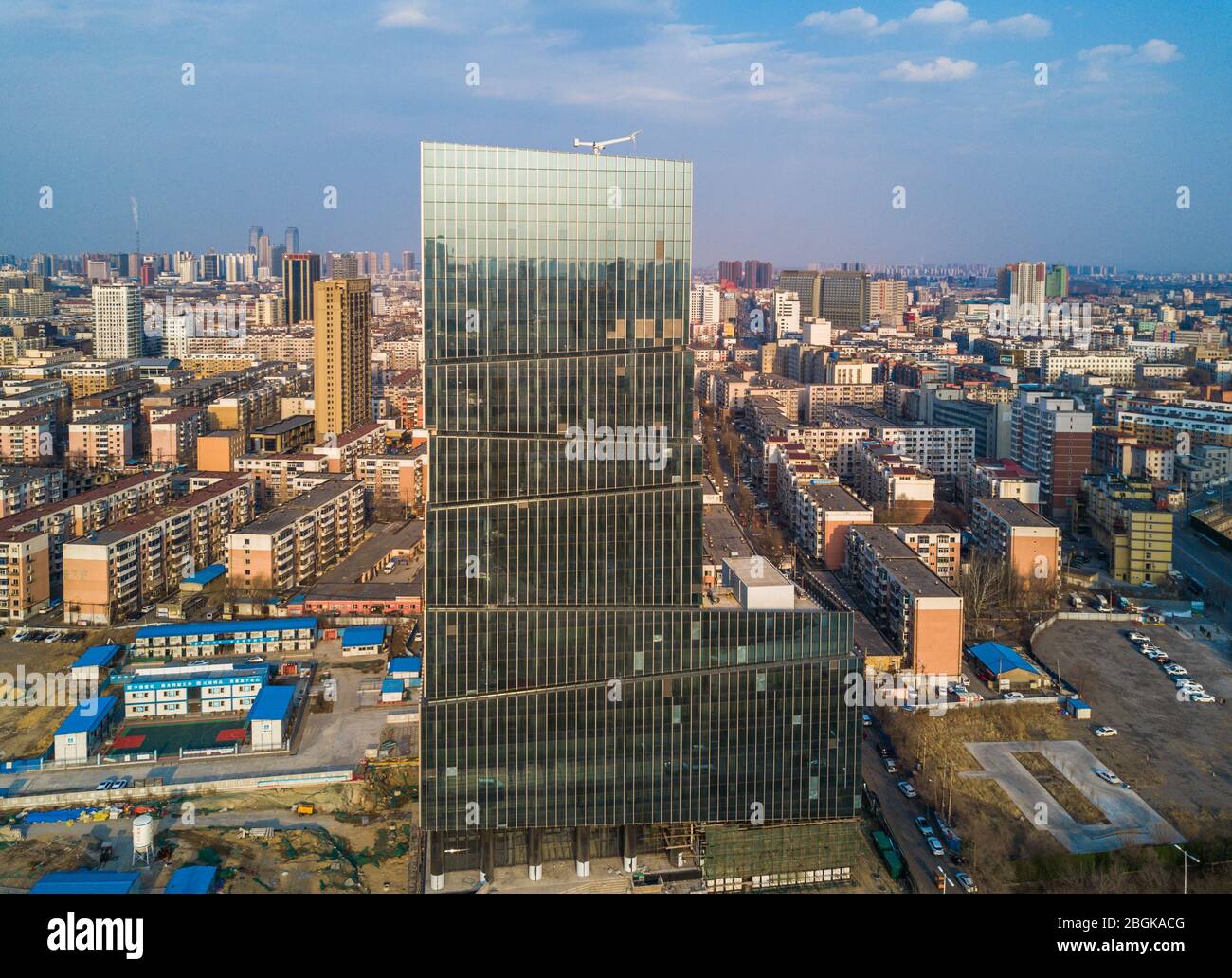 An aerial view of a 50-meter-high boot-like building that attracts citizens  with its unique shape in city canter of Shenyang city, northeast China's L  Stock Photo - Alamy