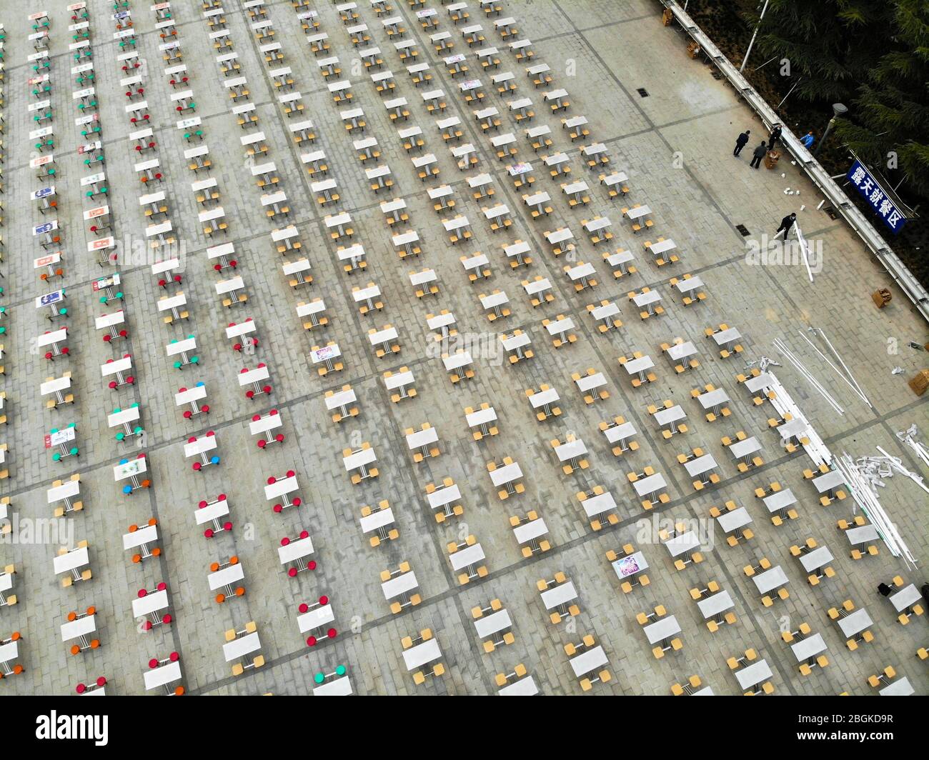 An aerial view of over 300 tables and 1200 chairs are moved outside of door and put on an opening area at Hunan University of Technology, Zhengzhou ci Stock Photo