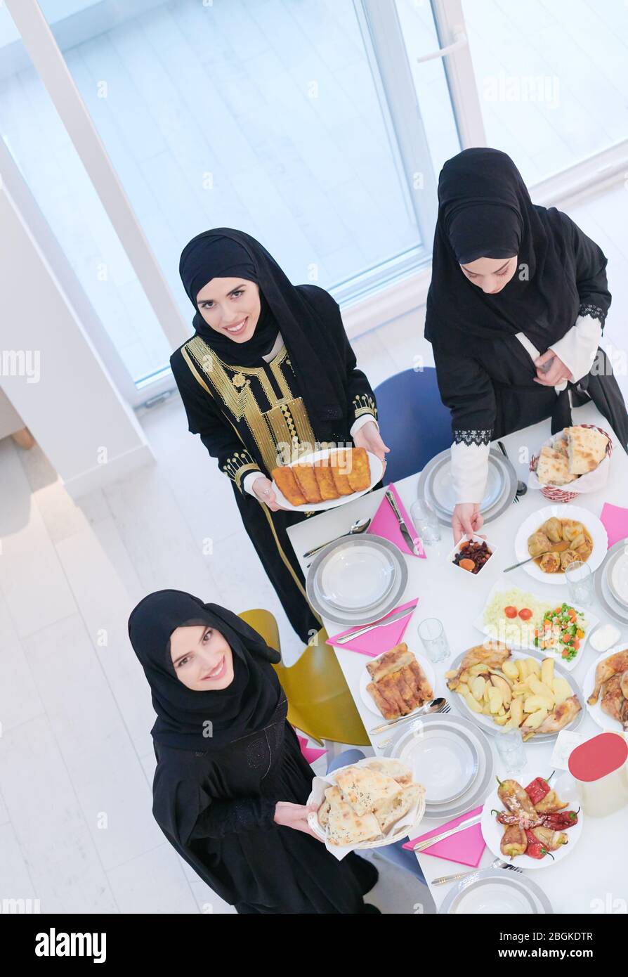 Eid Mubarak Muslim family having Iftar dinner young muslim girls ...