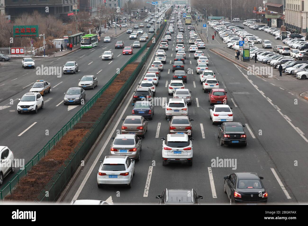 Traffic stream, composed of vehicles transporting passengers, moves on